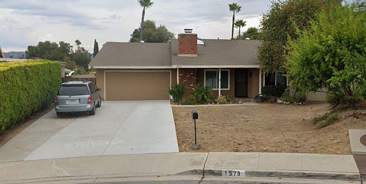 Front of house, large driveway. Parking is shared in driveway, plenty of street parking