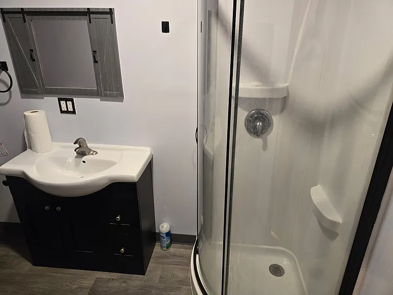 Corner shower in Bathroom off Bedroom 1.
