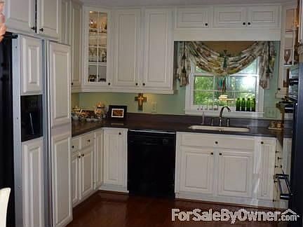 Eat in kitchen with custom cabinetry