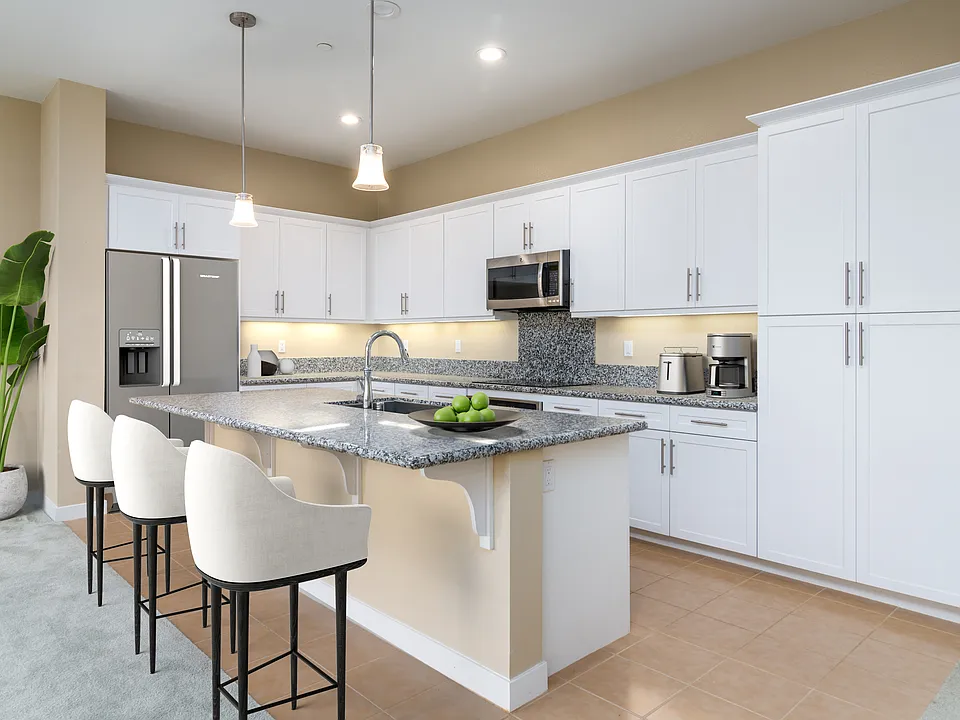 Kitchen has plenty of counter space and cabinets

(Virtually staged)