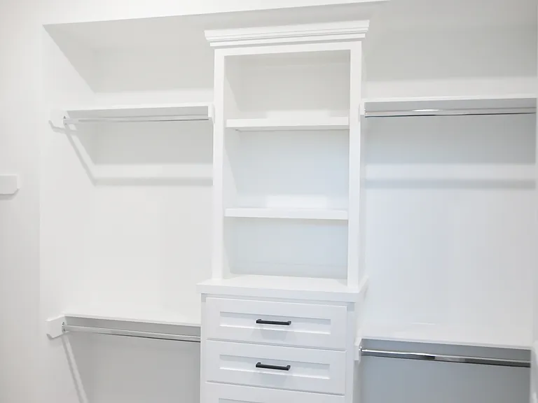 Primary main walk-in closet.