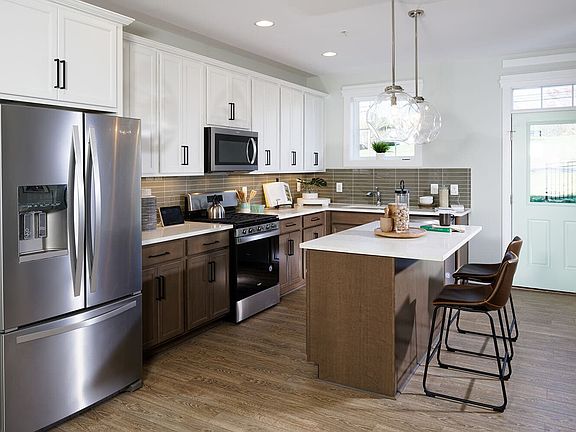 An example of the alternate rear kitchen in the Versaille by Brookfield Residential