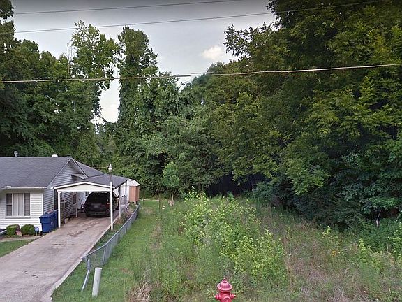 half cleared, half wooded