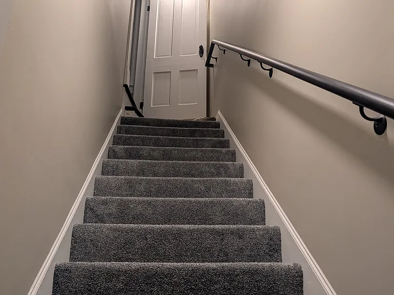 Back stairs to the third bedroom
