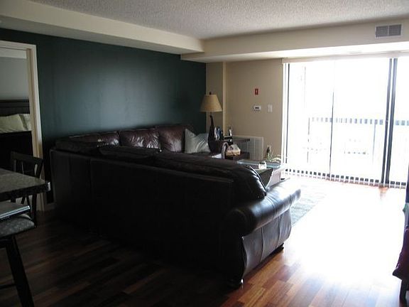 living room with hardwood brazillian cherry floors