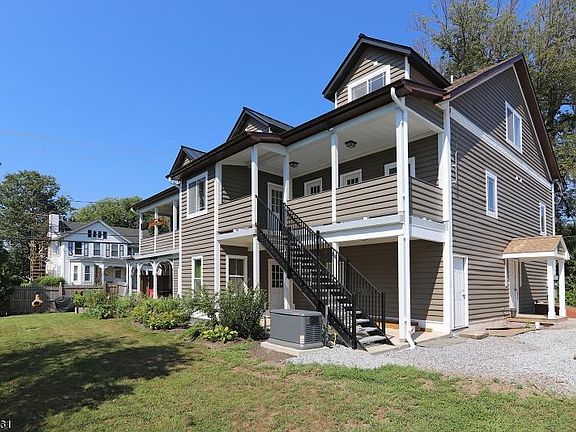 Apt 5's entrance is on the right-hand side, each apartment has an outlet accessible to the generator.