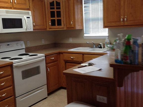 Clean, bright, & open kitchen to the living area