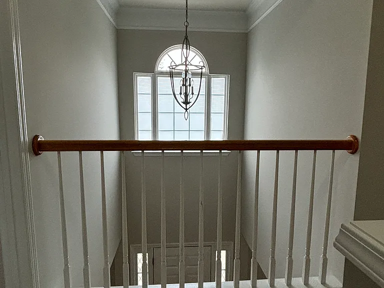 View of the foyer and the chandelier.