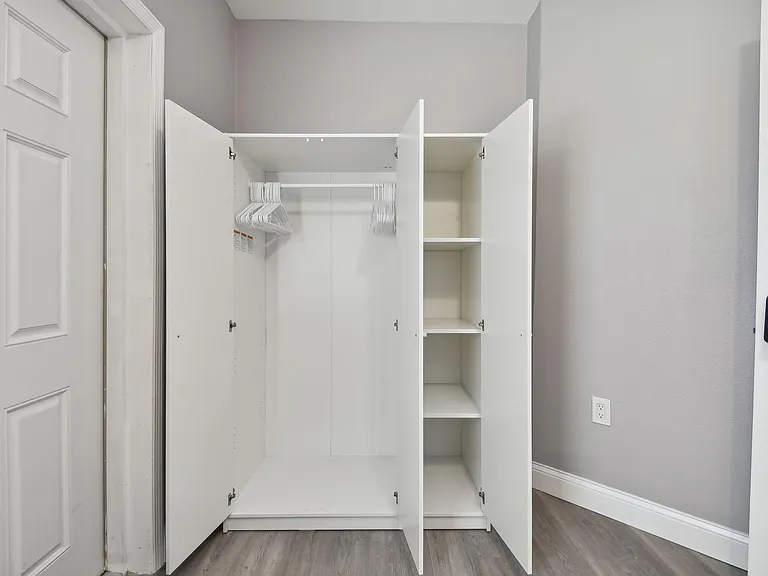 Armoire for hanging clothes and storage