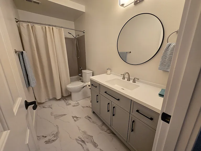 Another shot of the bathroom with more forgiving lighting to get a sense of how light changes the reflection from the walls.