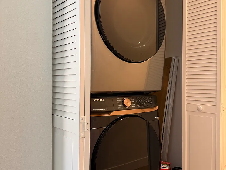 Utility closet located down hallway
