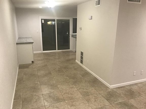 New sliding door and expanded kitchen cabinets