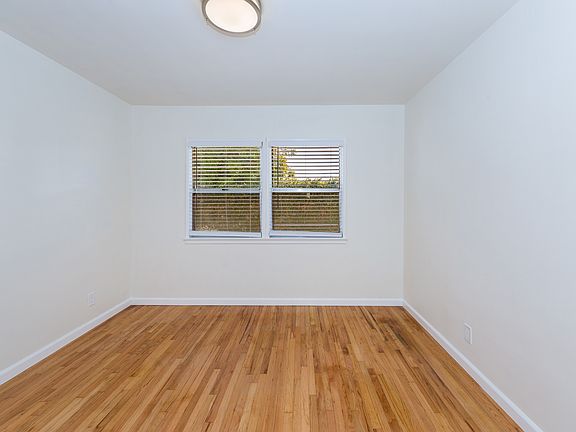 Revarnished original wood floor.