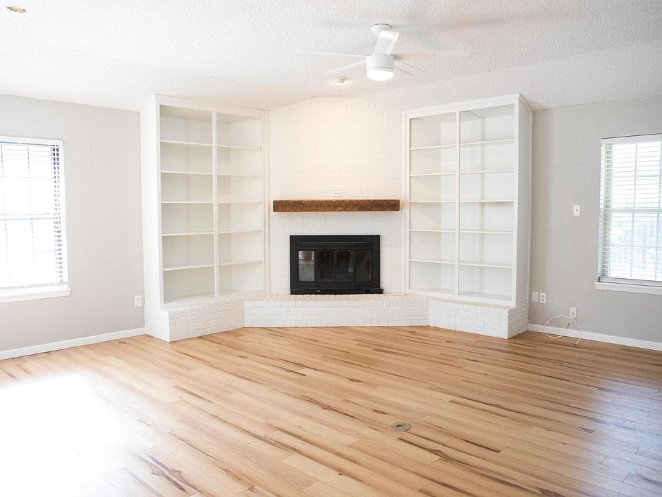 Living room with wood burning fireplace (and blower)