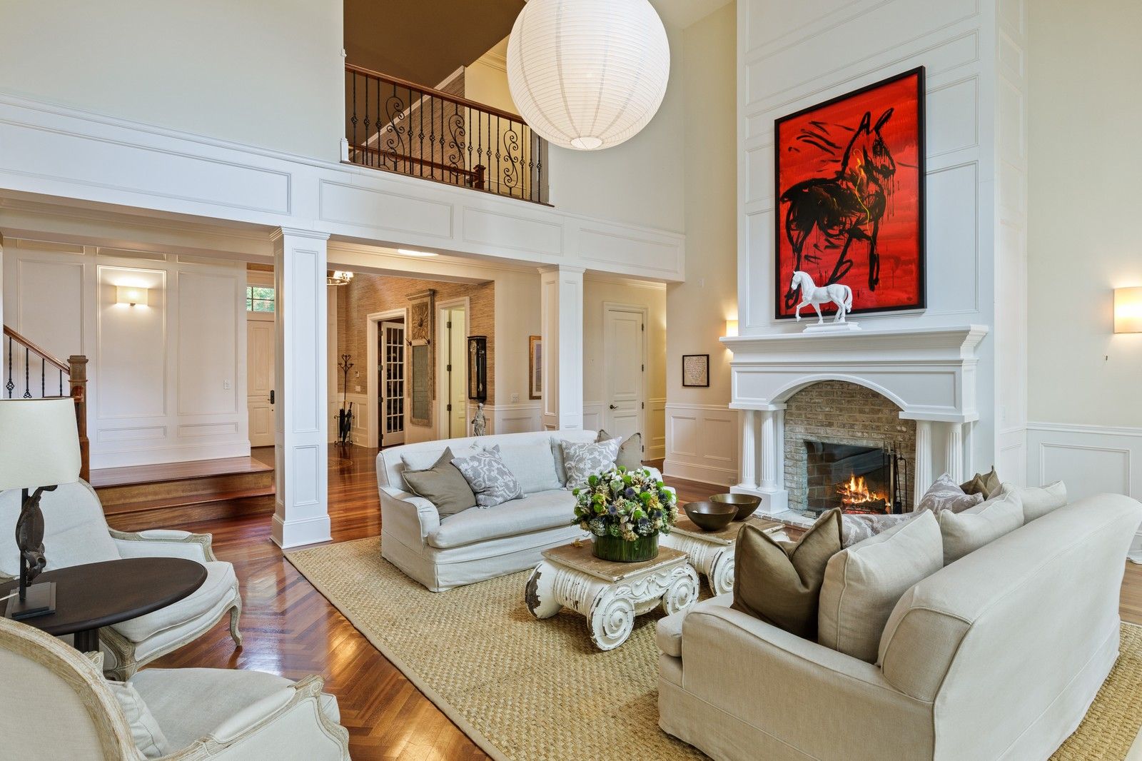  DOUBLE HEIGHT LIVING ROOM WITH FIREPLACE