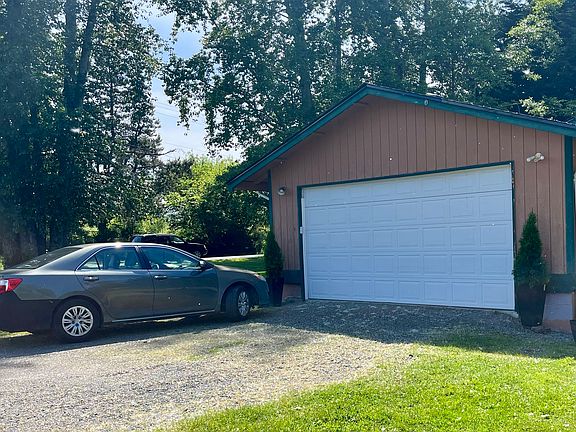 Double car garage and plenty of outdoor parking.