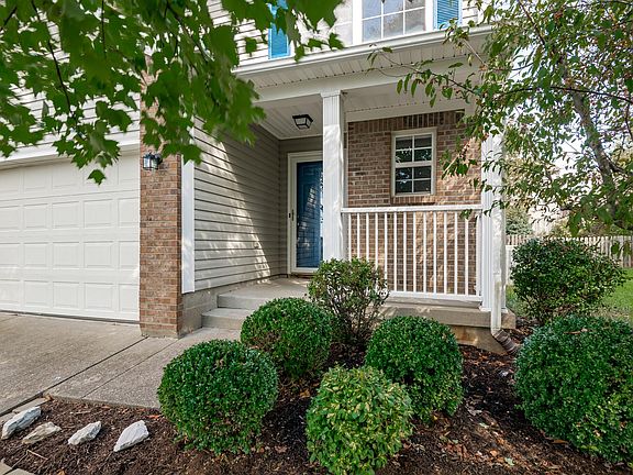 The front porch has room for a chair or two to sit and enjoy the outside air.