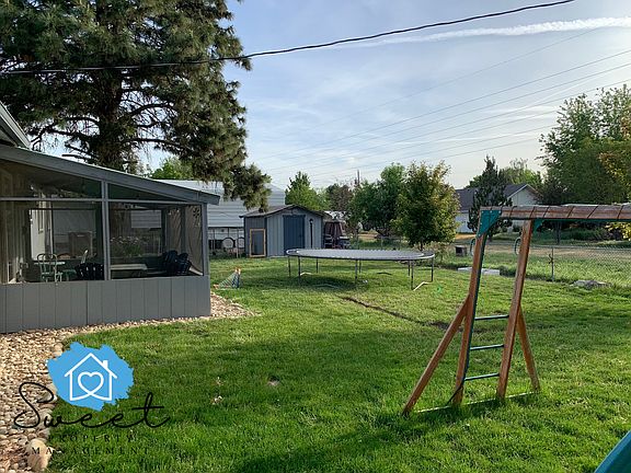 Trampoline and swing set not included. Storage shed is included and available.