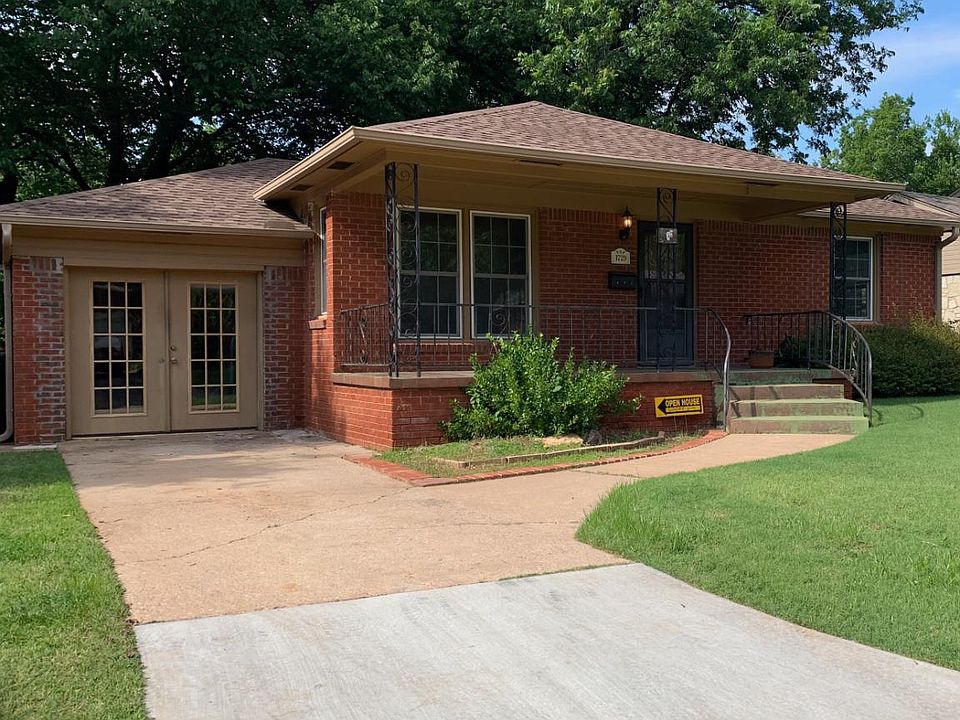Great curb appeal, with a large front porch for enjoying the quiet neighborhood.
