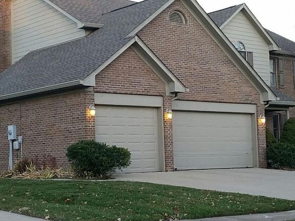 3 car garage with side service door.  House is full brick lower level and most of front.