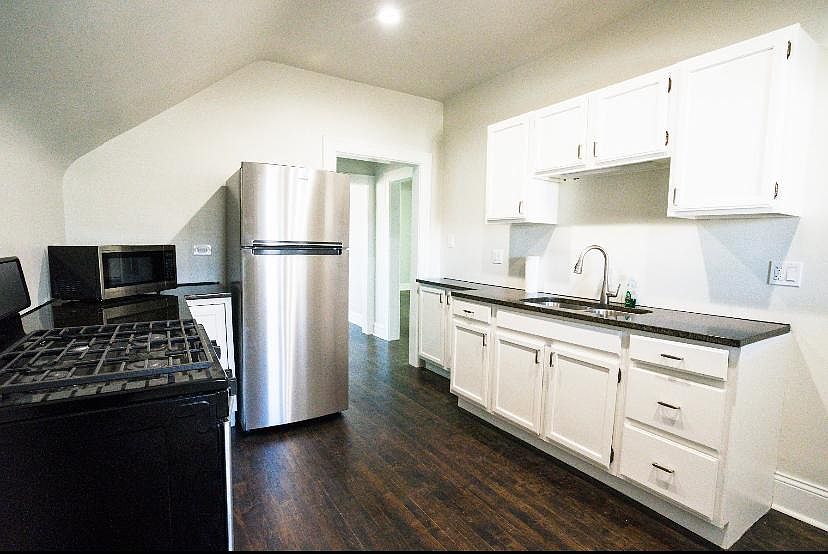 Refinished cabinets, Granite countertops, and stainless steel appliances