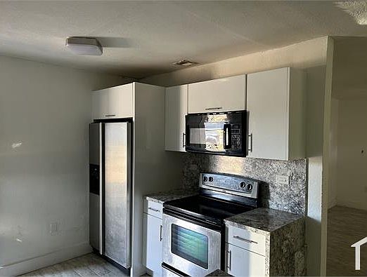 2nd image of 9400 NW 32nd Ave