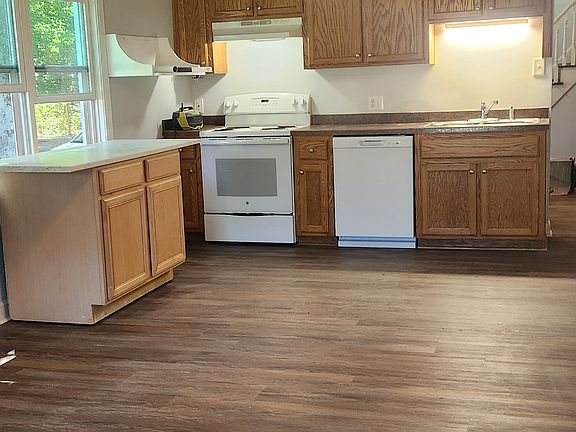 Large kitchen with movable island.