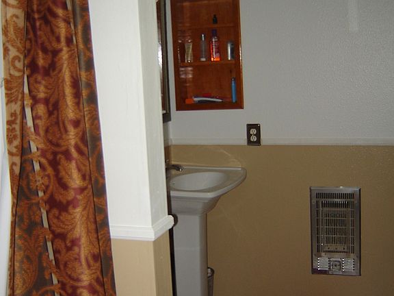 Ceramic tiles, new sink, toilet, shower