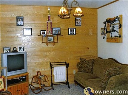 Living room with solid oak wall