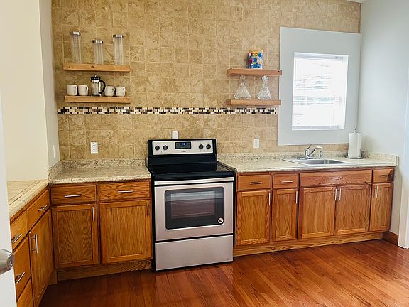 Kitchen with floating shelves.