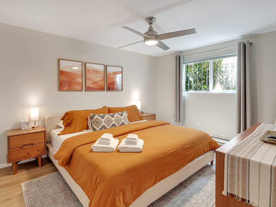 Cozy king bed in primary bedroom.
