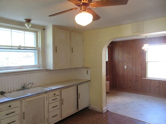 Just off the kitchen is the kitchen dining area or could be a playroom for kids. Maybe even an offic