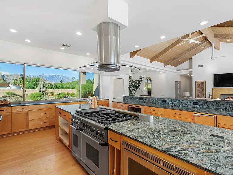 DOUBLE ISLAND KITCHEN WITH SLAB GRANITE, GAS STOVE DOUBLE OVENS, TWO DISHWASHERS