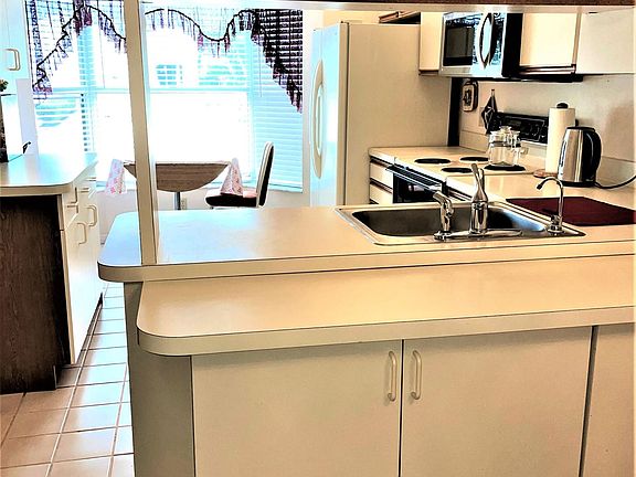 5th image of 10813 SE Sea Pines Cir