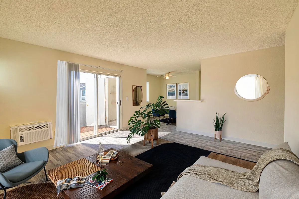 Light-filled living area with views and room to relax. - Villa Monterey