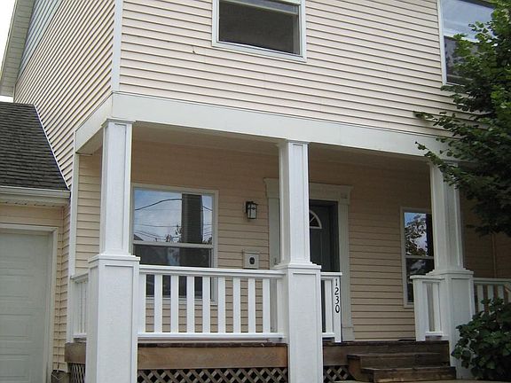 Front of townhome with covered porch