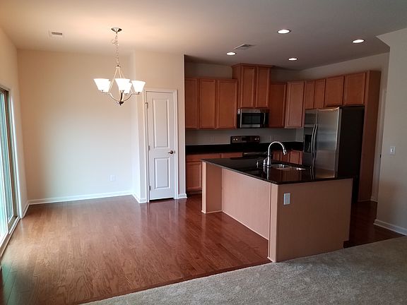 Kitchen and dining area, view from the living space