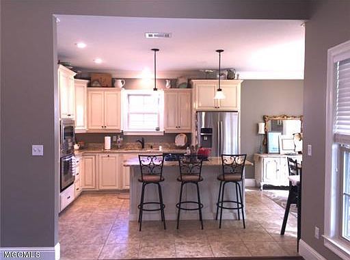 4th image of 3816 Acadian Village Dr