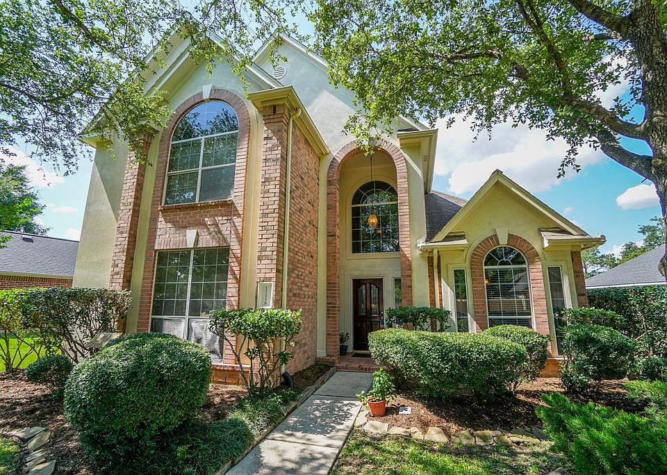 Mature trees provide shade to this great 4 bedroom/2.5 bath former model home. Brand new roof just installed!
