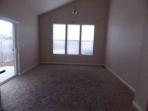 Living room with patio on left