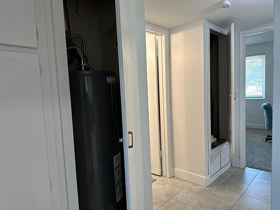 Water heater and furnace in the open closet doors