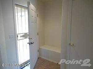 Bench area behind front door