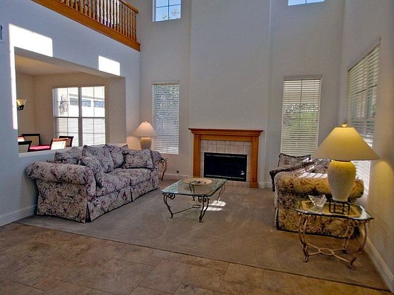 FORMAL LIVING ROOM WITH SOARING CEILINGS