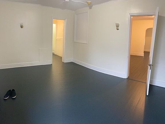 Bedroom looking at bathroom and living room.