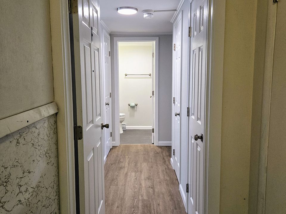 Entry hallway with lots of closets