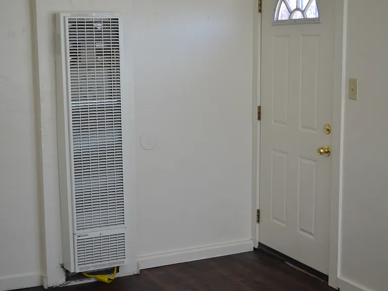 Front Door & Heating Wall Unit