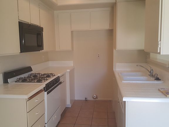 kitchen area with dishwasher