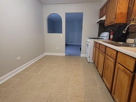 Kitchen with view of living room