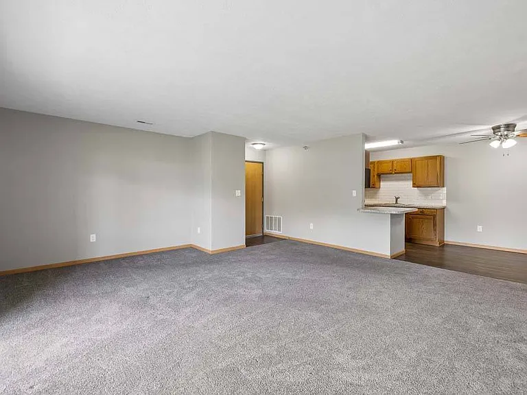 A spacious open floor plan creates a warm, inviting atmosphere with plenty of room to relax, entertain, and make yourself at home.