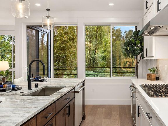 Enjoy greenbelt views while cooking